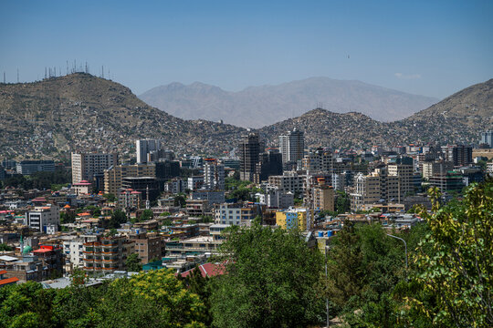 View over Kabul from Wazir Mohammad Akbar Khan hill offers a glimpse of city life and surrounding mountains in Afghanistan