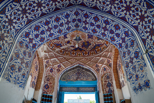 Beautiful entrance to the blue mosque in Mazar-e-Sharif offers a view of intricate designs and cultural heritage in Afghanistan