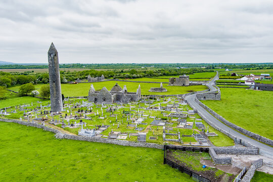 Aerial view of Kilmacduagh Abbey and cemetery near Gort, County Galway, Ireland. Historic monastic site and round tower in the Kiltartan landscape of south Galway.