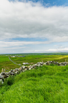 Coastal landscape near Doonagore Castle and Doolin, County Clare, Ireland. Scenic Atlantic farmland on the Wild Atlantic Way with views toward the Aran Islands.
