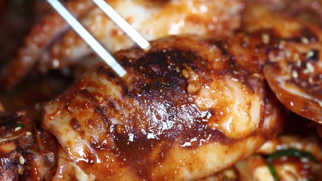 Bouncy, spicy seasoned squid seafood stew that you press with chopsticks