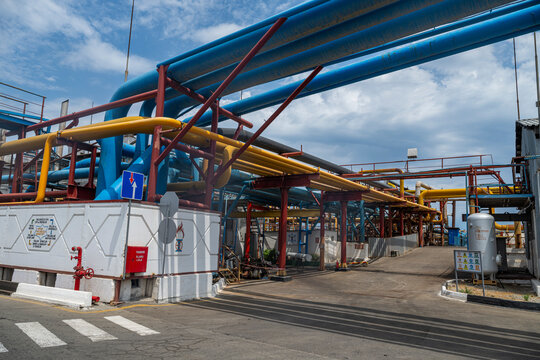 Exploration of oil infrastructure in the largest oil city Oil rocks in Azerbaijan with pipelines and industry facilities