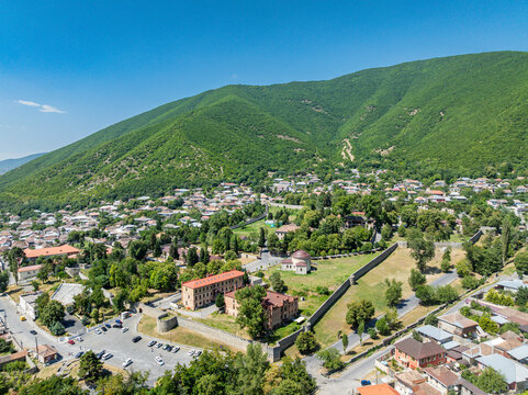 Overview of Khan's Palace at UNESCO site in Sheki showcasing unique architecture and surrounding landscape in Azerbaijan