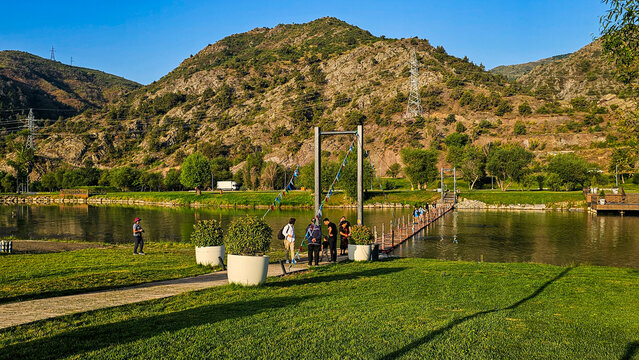 Visiting the mountain resort Lachin in Qarabaqh, Azerbaijan during a sunny afternoon by the water