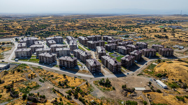 Rebuilt residential area in Jabrayil, Qarabaqh showing new apartments and infrastructure under clear sky in Azerbaijan