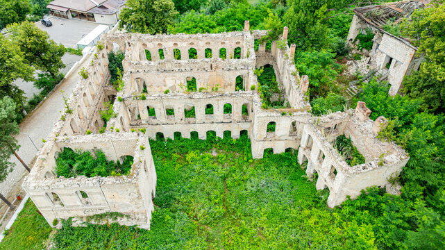 Bird's eye view of the ruins of an old palace with greenery in Qarabaqh, Azerbaijan
