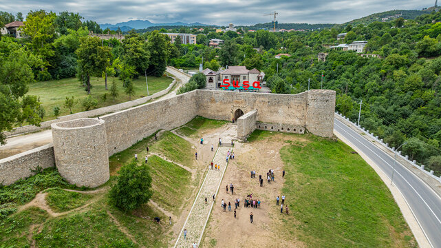 Citadel of Shusha with visitors and greenery surrounding the fortress in Qarabaqh, Azerbaijan