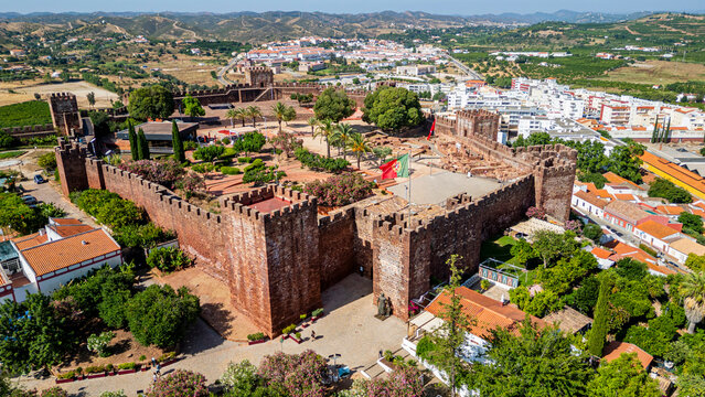 Fortified city of Silves seen from above in Algarve, Portugal with historical buildings and surrounding landscape
