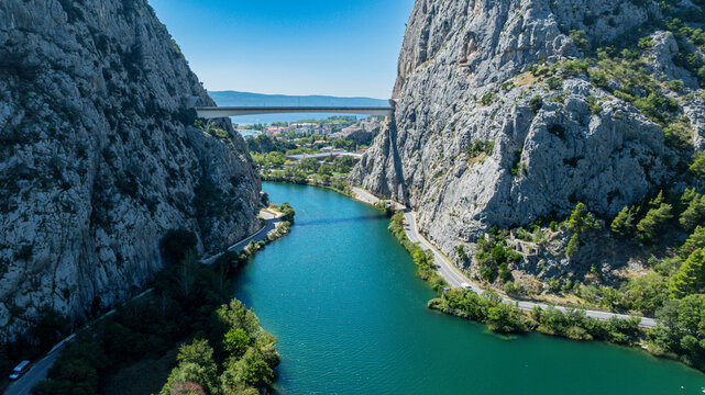 Scenic view of the Cetina gorge and river revealing rocky cliffs and turquoise waters in Croatia during a sunny day