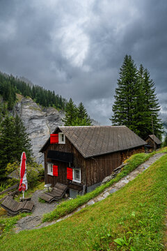 Cloudy day at Tschinglengorge with traditional house and surrounding nature in Switzerland