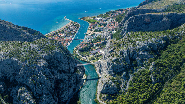 Bird's eye view of the river and town near the coast in Croatia during daytime