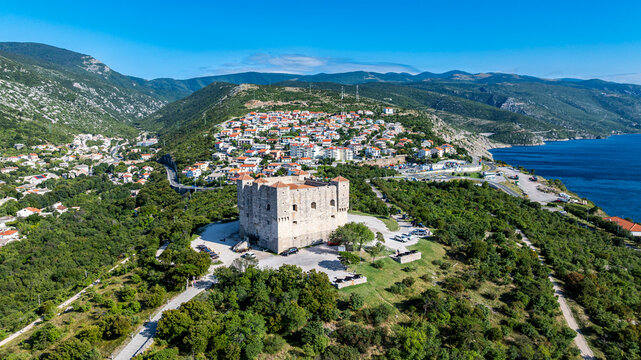 View of Senj in Croatia with historical castle and green landscape near the coast