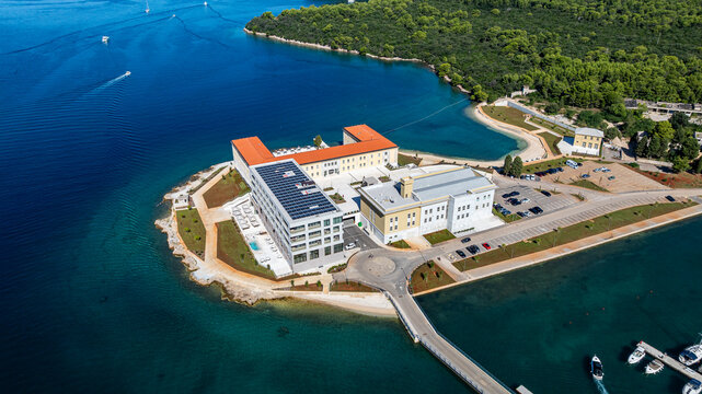 Luxury resort located on a peninsula in Pula, Istria, Croatia, with a view of the water and coastal landscape