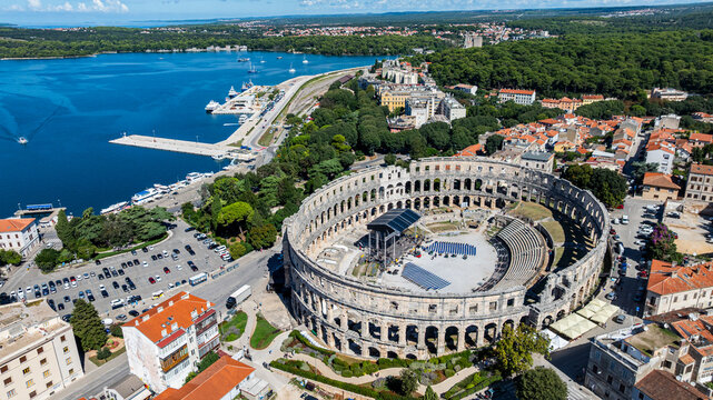 Aerial view of the Roman amphitheatre in Pula showcasing its structure and surrounding area from a high perspective in Croatia