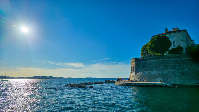 Exploring the Venetian Works of Defence along the waterfront in Zadar, Croatia during a sunny day