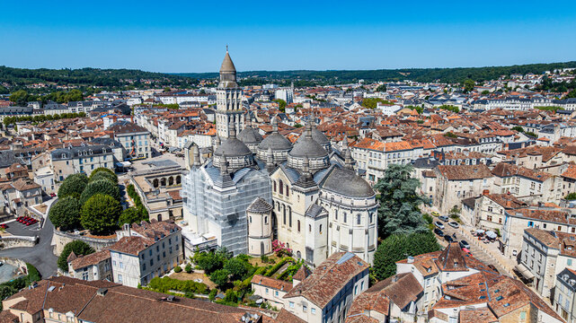 Aerial view of Saint Front cathedral in Perigueux surrounded by cityscape under clear sky in France