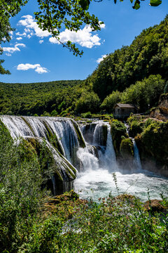 Discover Strbacki buk waterfall in Una National Park, Bosnia and Herzegovina on a bright sunny day