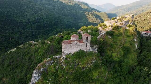 Asen Fortress Mountain Serpentine Road Drone Aerial Panoramic View Rhodope Mountains Landscape Medieval Church Asenova Krepost Bulgaria Summer Travel Tourism Concept