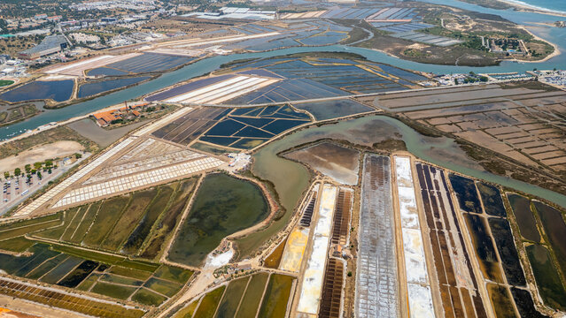 Exploration of saltpans and waterways observed from above in Algarve, Portugal