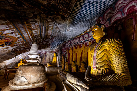 Buddha statues in Dambulla cave temple showcase ancient craftsmanship and spiritual significance in Sri Lanka