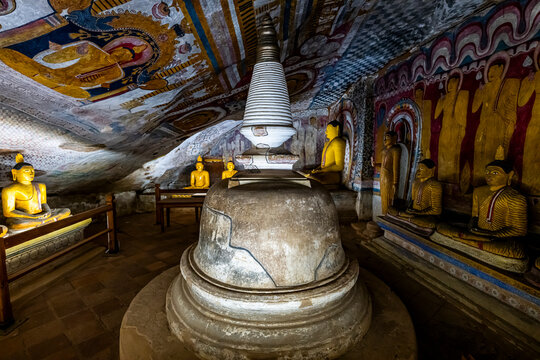 Buddha statues and ancient stupa in Dambulla cave temple in Central district Sri Lanka