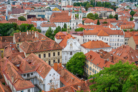 View over rooftops and buildings in Graz from Schlossberg in Austria during daytime