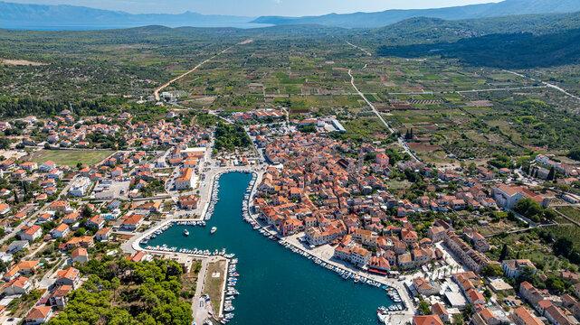 Exploring old town of Stari Grad and Stari Grad plain from above in Croatia's scenic landscape