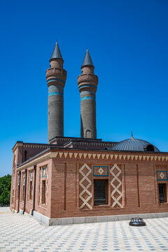 Mausoleum features distinct architecture with two minarets and decorative elements in Azerbaijan