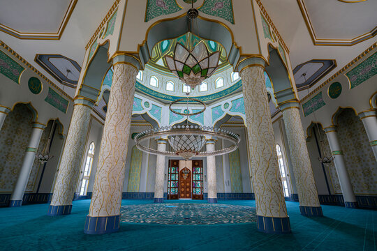 Interior view of Haydar Mosque showcasing its architectural design and colorful details in Azerbaijan