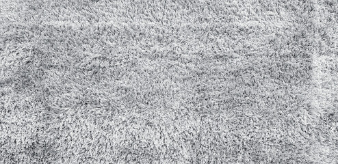 Top view of white shaggy carpet texture background © Vish Art