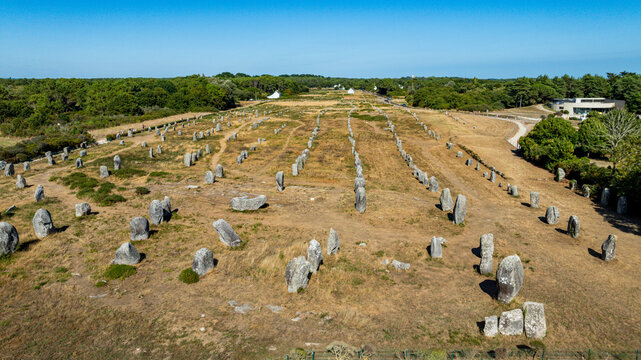 Exploring Menec megaliths in Carnac reveals ancient structures and their alignment in an open landscape of Brittany, France