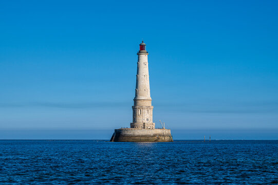 Visit to the historic lighthouse of Cordouan in France surrounded by blue waters and clear skies