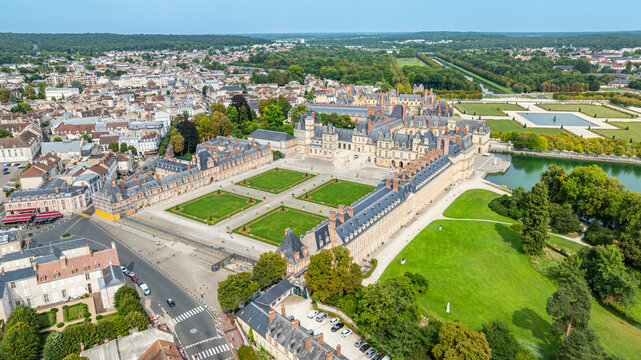 Exploring the beauty of Fontainebleau Palace from the sky near the historic town in France