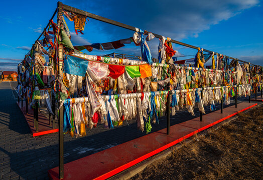 Praying flags adorn the main Buddhist monastery Thubten Shedrub Ling in Kyzyl, Republic of Tuva, during golden hour