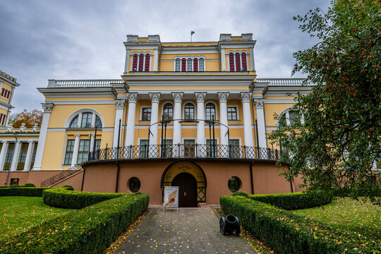 Visit the Rumyantsev-Paskevich Residence in Gomel Belarus during autumn with cloudy skies and lush green gardens