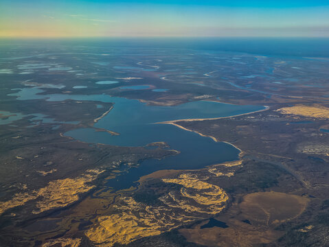 Aerial view of the Arctic landscape near Naryan-Mar in Nenets Autonomous Okrug, Russia during sunset