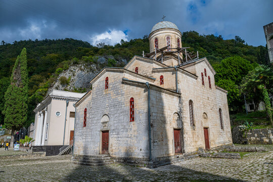 Saint Simon the Canaanite Church stands among trees in a mountainous area of New Athon