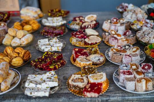 Turkish sweets displayed on a table in a market in Derbent, Russia, near the ancient fortress Naryn-Kala during a sunny day