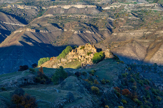Exploring an abandoned village in Dagestan, Russia located on a hillside surrounded by mountains and valleys