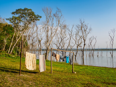 Laundry dries at the lakeside of Yaxha Lake near the archaeological site in Peten Guatemala
