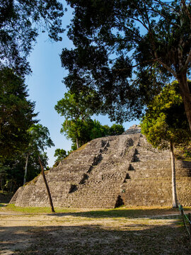 North Acropolis at Yaxha shows ancient architecture and natural setting in Guatemala's archaeological site
