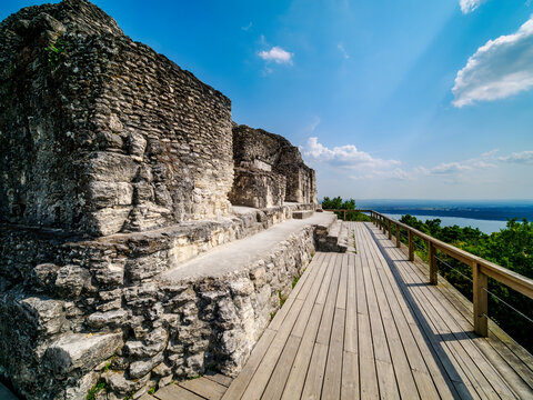 Exploring the ruins of Temple 216 at East Acropolis in Yaxha Archaeological Site in Guatemala