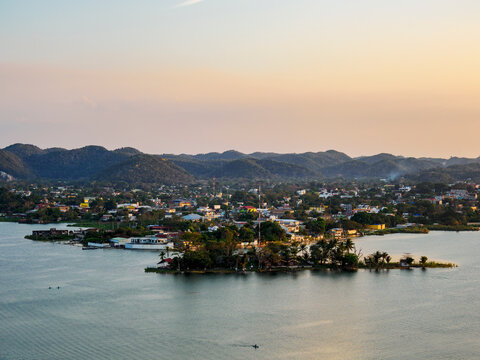 Views of Lake Peten Itza and San Benito from Mirador Rey Canek during sunset in Flores, Peten, Guatemala