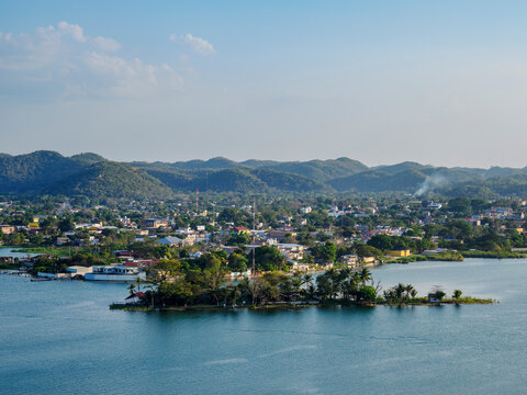 View of lake peten itza and san benito from mirador rey canek in guatemala