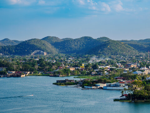View of lake peten itza and san benito from mirador rey canek in guatemala