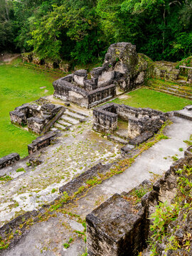 Exploring the ancient structures of the Central Acropolis in Tikal from a high viewpoint in Guatemala