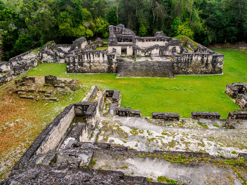 Exploring the ancient structures at Central Acropolis in Tikal, Peten, Guatemala during the day