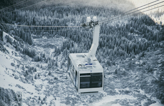 Winter landscape with cable car in Kasprowy Wierch area of Tatra mountains in Poland during snowy conditions
