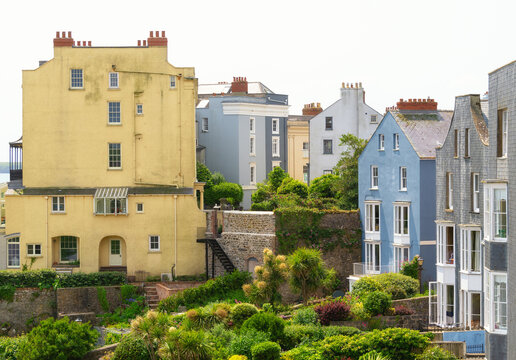 Pastel buildings in Tenby, Pembrokeshire display unique architecture in a coastal setting