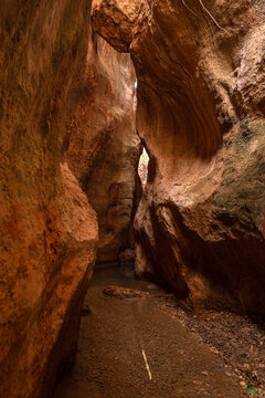 Golden light shines on the rock formations of Barranco de Luna in Villanueva Mesa during the afternoon